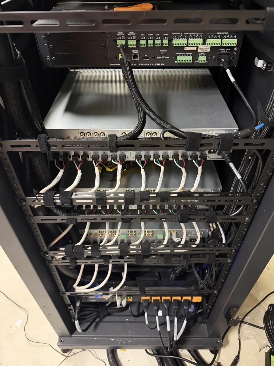 Behind the rack: service loops and strain relief nobody will ever see — and everyone will benefit from.